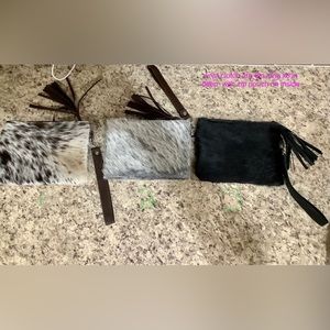 100% cowhide wrist clutch bag